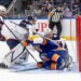 The Islanders' Anders Lee (27) is in the goal past Columbus Blue Jackets goaltender Jet Greaves (73) in what was initially scored a goal but was reversed in the third period on March 22, 2026.