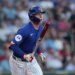 Chicago Cubs center fielder Pete Crow-Armstrong (4) hits against the Cincinnati Reds in the first inning at Sloan Park.