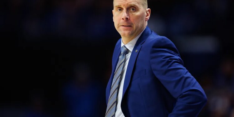 Kentucky Wildcats head coach Mark Pope on the sidelines during a game against the Florida Gators.