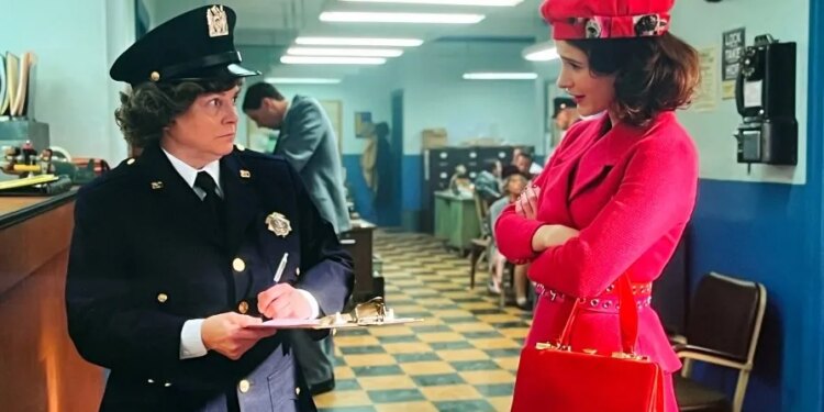 Wendy Davis as a cop talking to another woman in a scene from "The Marvelous Mrs. Maisel."