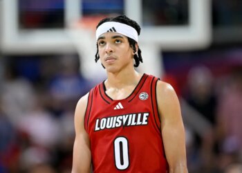 Louisville Cardinals guard Mikel Brown Jr. (0) looks on during the second half.