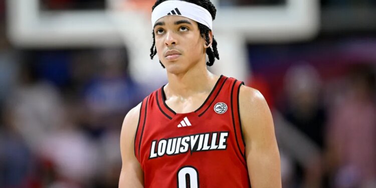 Louisville Cardinals guard Mikel Brown Jr. (0) looks on during the second half.