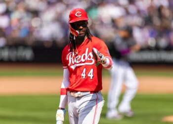 Cincinnati Reds shortstop Elly De La Cruz (44) reacts at third base.