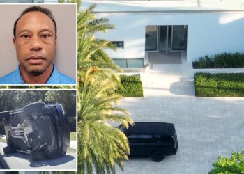 Exclusive photos of Tiger Woods' Florida home show his front door open, car in driveway