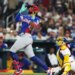 Dominican Republic's Fernando Tatis Jr. hits a three-run home run during the fourth inning of a World Baseball Classic game against Venezuela on March 11, 2026.