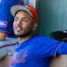 New York Mets Pitcher Freddy Peralta (51) sits in the dugout during Spring Training.