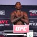 Israel Adesanya on the scale during the UFC Fight Night official weigh-ins for Adesanya vs Pyfer.