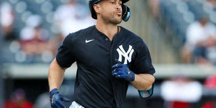 Giancarlo Stanton runs to first after ripping a single in the fourth inning of the Yankees' 12-1 blowout exhibition win over Panama on March 3, 2026.