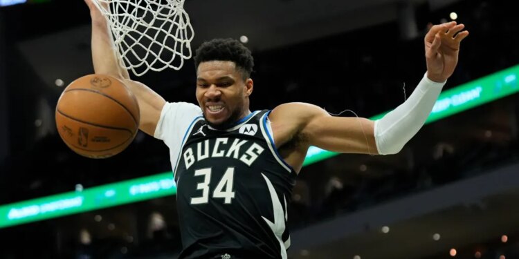Milwaukee Bucks' Giannis Antetokounmpo dunks during the second half of an NBA basketball game against the Indiana Pacers, Sunday, March 15, 2026, in Milwaukee.