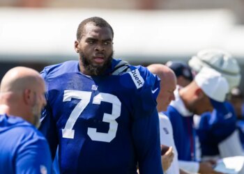 New York Giants offensive tackle Evan Neal (73) looks on during training camp at the Quest Diagnostics center, Tuesday, July 29, 2025, in East Rutherford, New Jersey.