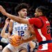 Cameron Boozer looks to make a move on Bryce Hopkins during the first half of St. John's 80-75 loss to Duke in their Sweet 16 matchup on March 27, 2026 in Washington.
