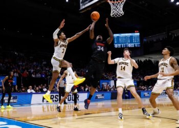 Bryce Harris who scored 19 points and grabbed 14 rebounds, goes up for a layup during Howard's 86-83 win over UMBC in a First Four matchup on March 17, 2026.
