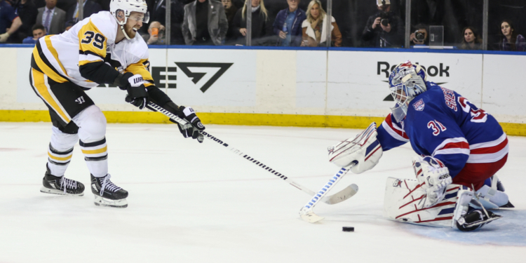 Pittsburgh Penguins right wing Anthony Mantha (39) makes a shot on goal attempt against New York Rangers goaltender Igor Shesterkin (31) during a shootout.
