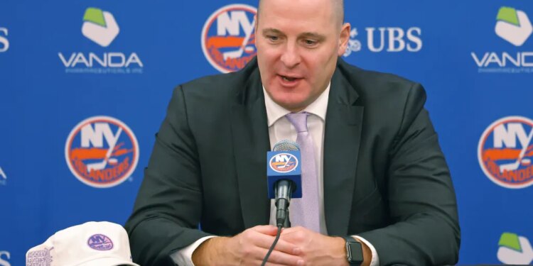 New York Islanders GM Mathieu Darche speaking at a press conference.