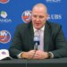 New York Islanders GM Mathieu Darche speaking at a press conference.