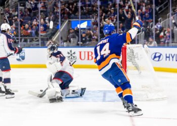Bo Horvat (14) of the New York Islanders celebrates his goal against Columbus Blue Jackets Goaltender Jet Greaves (73).