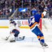Bo Horvat (14) of the New York Islanders celebrates his goal against Columbus Blue Jackets Goaltender Jet Greaves (73).