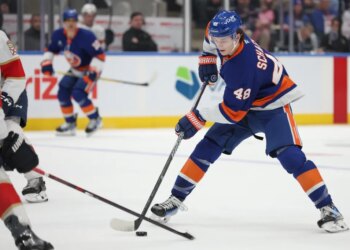 New York Islanders defenseman Matthew Schaefer (48) handles the puck during the first period of a game against the Florida Panthers.