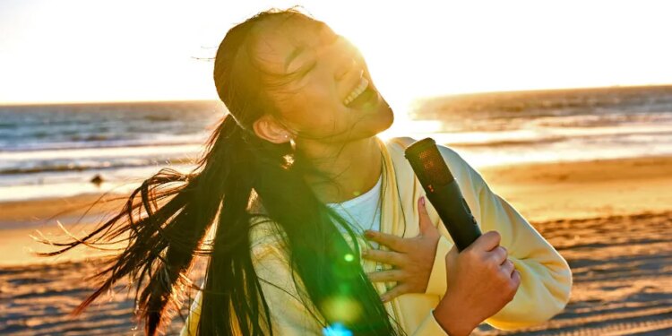 JBL’s new party speaker comes with a karaoke mic that helps you hit those high notes