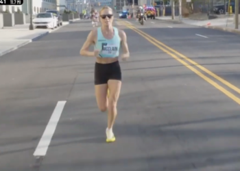 Jess McClain is in the lead with about a mile to go in the  U.S. Half Marathon Championships on Sunday.