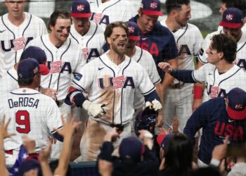 Bryce Harper celebrating after hitting a two-run home run.