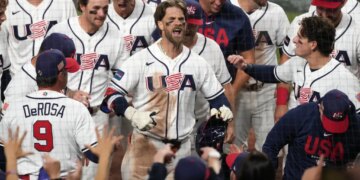 Bryce Harper celebrating after hitting a two-run home run.