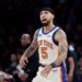 New York Knicks guard Jose Alvarado reacting on the court.