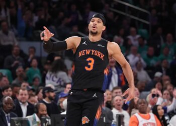 New York Knicks guard Josh Hart #3 reacts on the court.