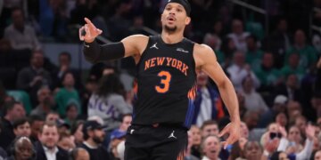 New York Knicks guard Josh Hart #3 reacts on the court.