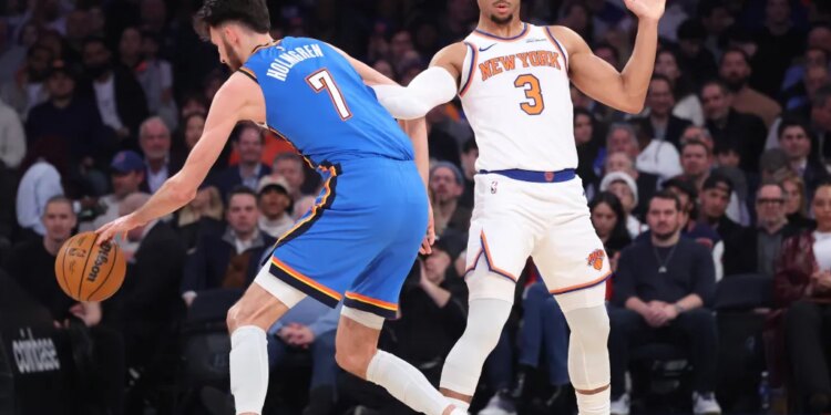 Josh Hart defends against Chet Holmgren during the Knicks' 103-100 loss to the Thunder at the Garden on March 4, 2026.