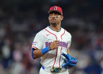 Dominican Republic center fielder Julio Rodriguez (44) returns to the dugout against the Netherlands during the sixth inning.