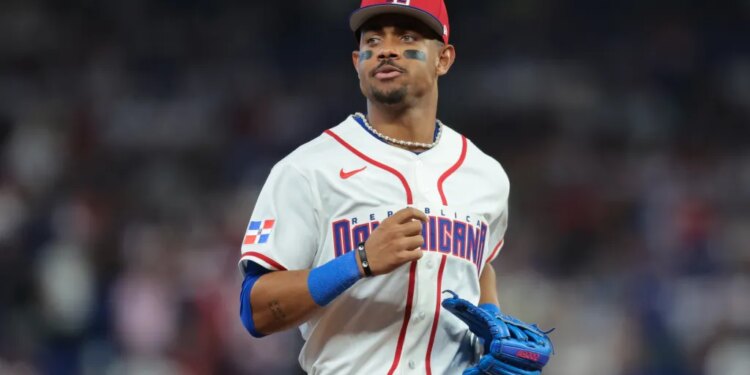Dominican Republic center fielder Julio Rodriguez (44) returns to the dugout against the Netherlands during the sixth inning.