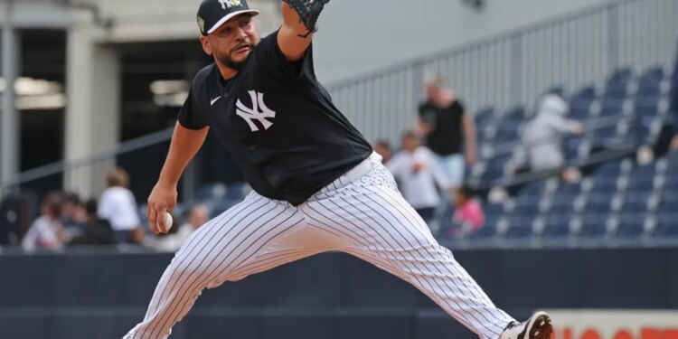 New York Yankees pitcher Kervin Castro #74 throwing live batting practice at Steinbrenner Field.