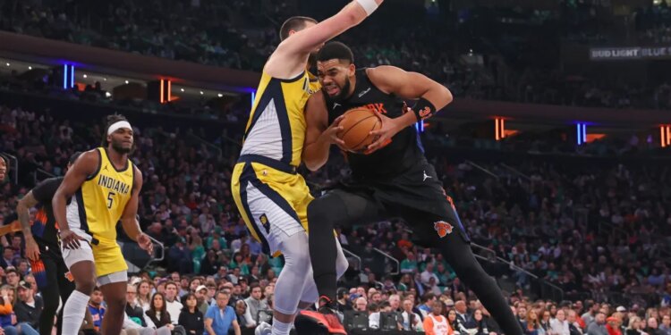 Karl-Anthony Towns drives on Ivica Zubac during the Knicks' blowout win over the Pacers on March 17, 2026 at the Garden.