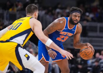 Mitchell Robinson, who grabbed 22 rebounds, drives on Ivica Zubac during the Knicks' 101-92 win over the Pacers on March 13, 2026 in Indianapolis.