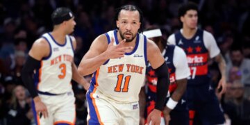 Jalen Brunson of the New York Knicks reacts after a three-point shot.