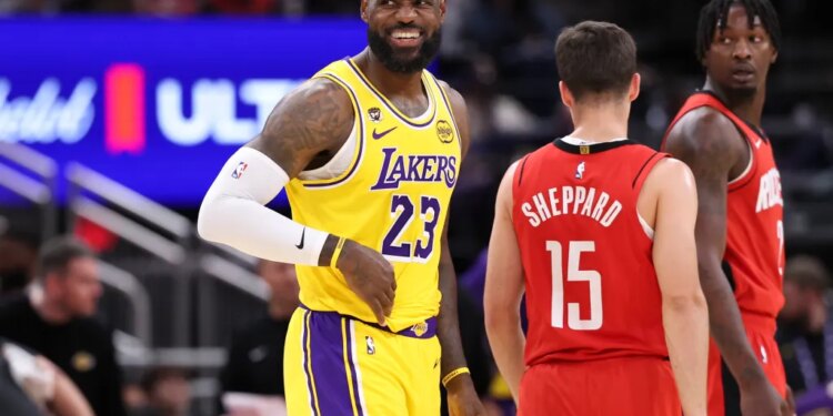 LeBron James smiling in his Los Angeles Lakers jersey.