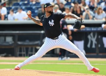 New York Yankees starting pitcher Luis Gil (81) throws a pitch.