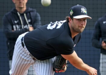 Gerrit Cole, throwing earlier in the spring training, said he is trying to be "optimistic" that there won't be a lockout next season.