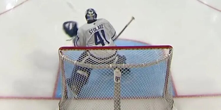 Maple Leafs goalie Anthony Stolarz takes a puck to the throat during warmups on March 21, 2026.