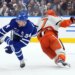 Toronto Maple Leafs Auston Matthews (34) is injured by Anaheim Ducks Radko Gudas (7) during a hockey game.