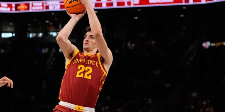 Iowa State's Milan Momcilovic shoots during the first half of an NCAA college basketball game against Arizona in the semifinal round of the Big 12 Conference tournament Friday, March 13, 2026, in Kansas City, Mo. (AP Photo/Charlie Riedel)