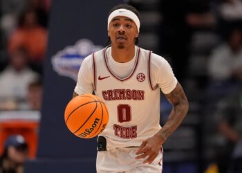 Alabama guard Labaron Philon (0) moves against Mississippi during the second half of an NCAA college basketball game in the quarterfinal round of the Southeastern Conference tournament, Friday, March 13, 2026, in Nashville, Tenn.