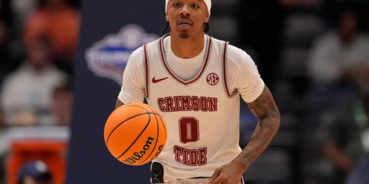 Alabama guard Labaron Philon (0) moves against Mississippi during the second half of an NCAA college basketball game in the quarterfinal round of the Southeastern Conference tournament, Friday, March 13, 2026, in Nashville, Tenn.