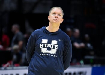 Utah State Aggies head coach Jerrod Calhoun watching practice before the first round of the NCAA Tournament.