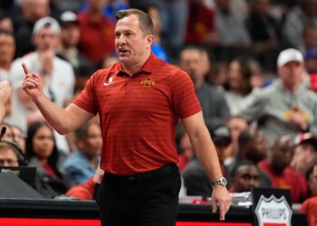 Iowa State head coach T.J. Otzelberger on the sidelines during a college basketball game.
