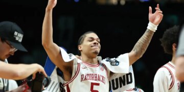 Arkansas guard Darius Acuff Jr. (5) reacts after the second round of the NCAA college basketball tournament.