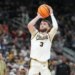 Purdue's Braden Smith (3) shoots a 3-point basket in an NCAA tournament game.