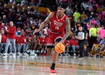 Texas Tech forward JT Toppin drives against Arizona State during the first half of an NCAA college basketball game, Tuesday, Feb. 17, 2026, in Tempe, Ariz. (AP Photo/Rick Scuteri)