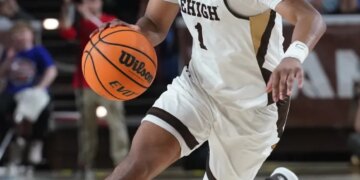 Lehigh Mountain Hawks guard Nasir Whitlock dribbles the ball during a game.